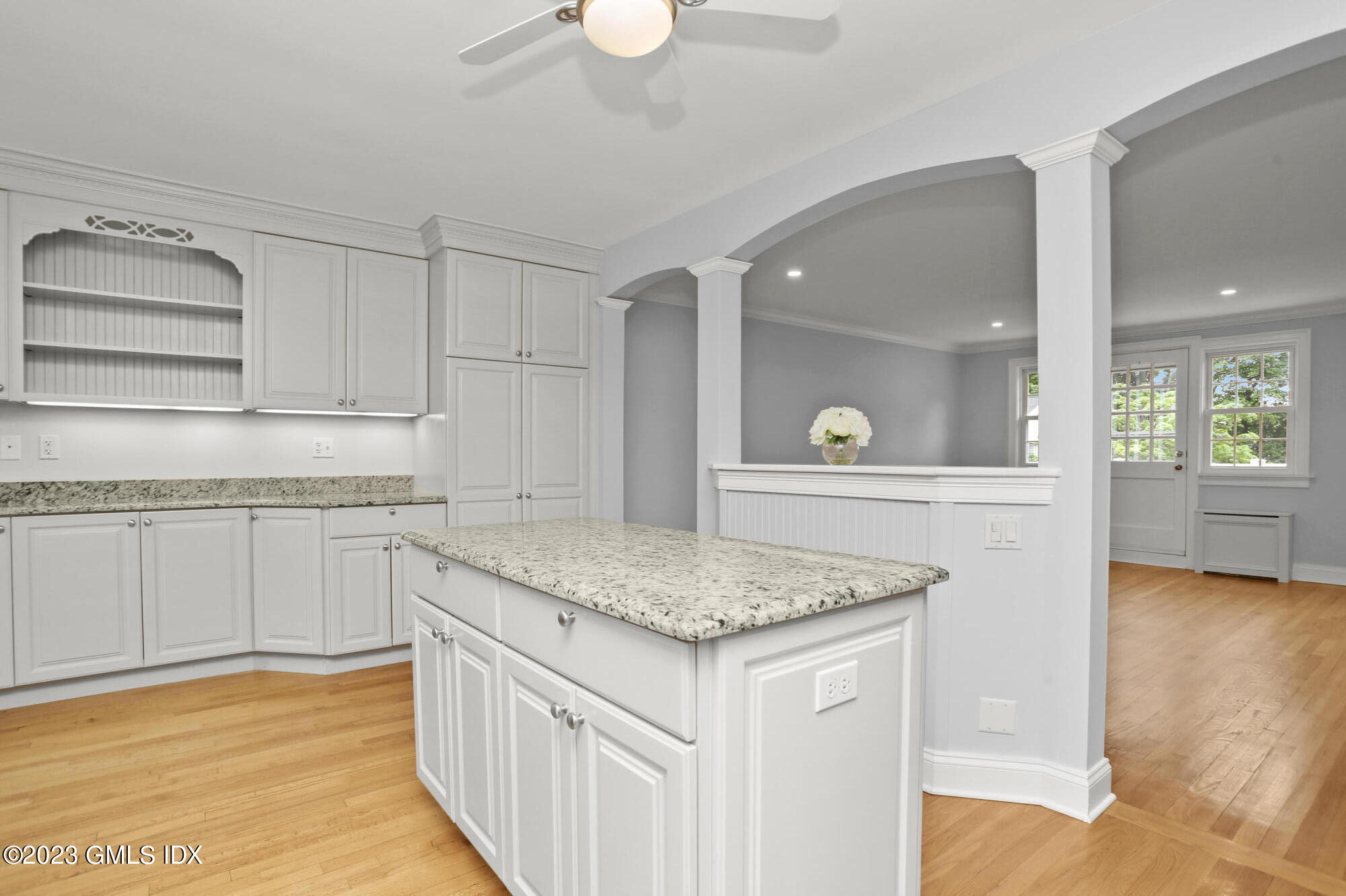 149 Putnam Park, Unit 149 Greenwich, CT 06830 - Photo 8 of 43 a kitchen with white cabinets and sink