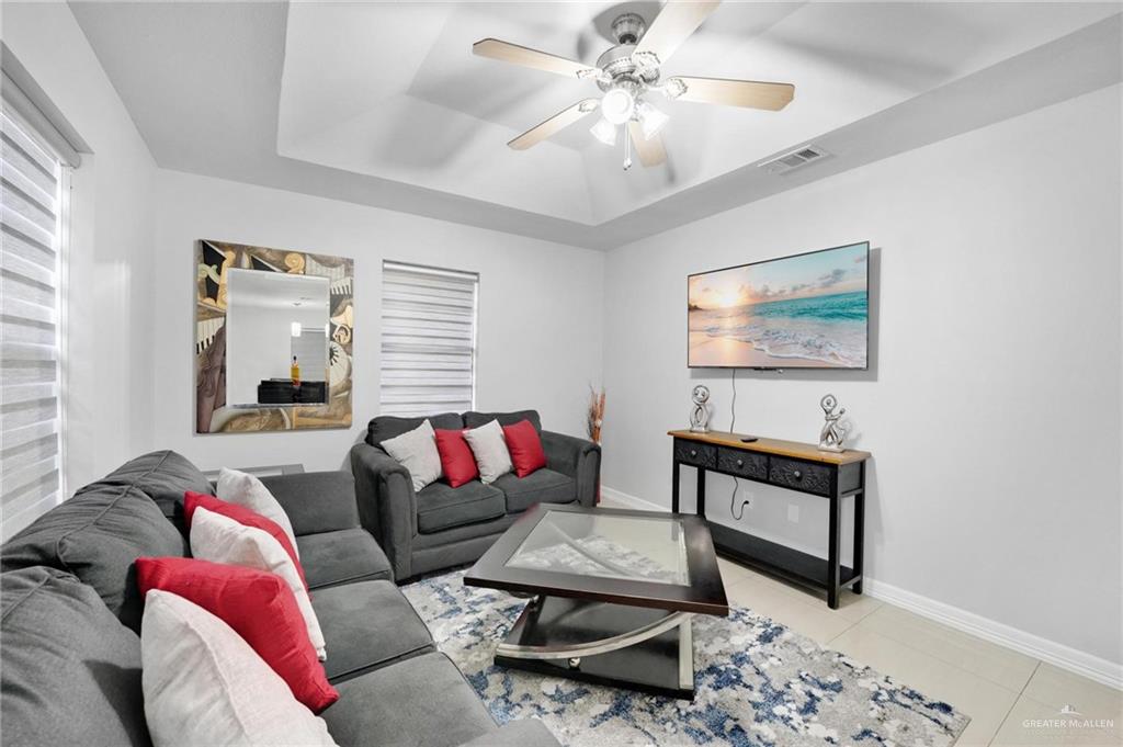 1103 West 26th Street Mission, TX 78574 - Photo 4 of 16 a living room with furniture and a window