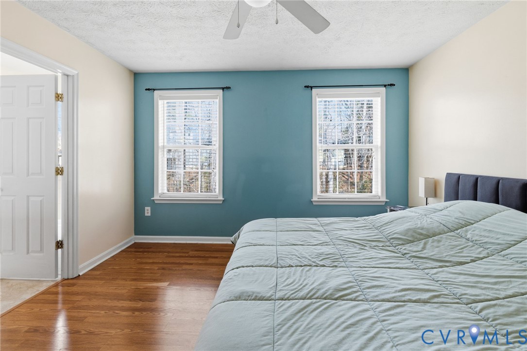 504 Gloucester Drive Ruther Glen, VA 22546 - Photo 10 of 28 a bedroom with a bed and a window