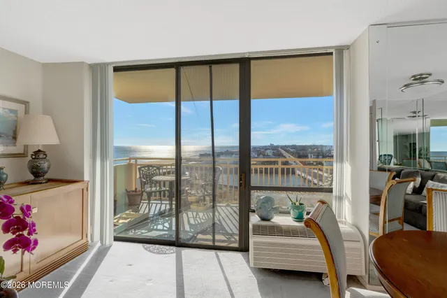 a spacious bedroom with a bed and furniture