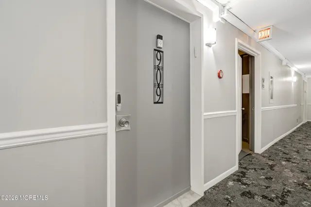 a view of a hallway with closet