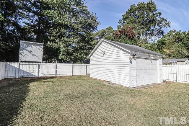 a view of a house with a garage