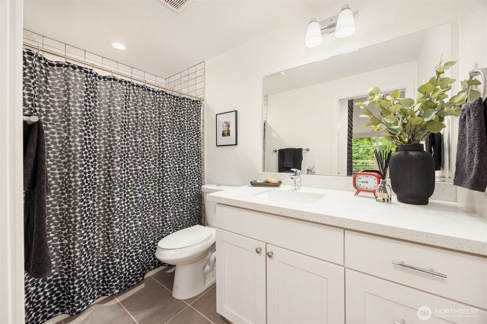 400 Southwest Forest Place Issaquah, WA 98027 - Photo 20 of 24 a bathroom with a sink a toilet and a shower