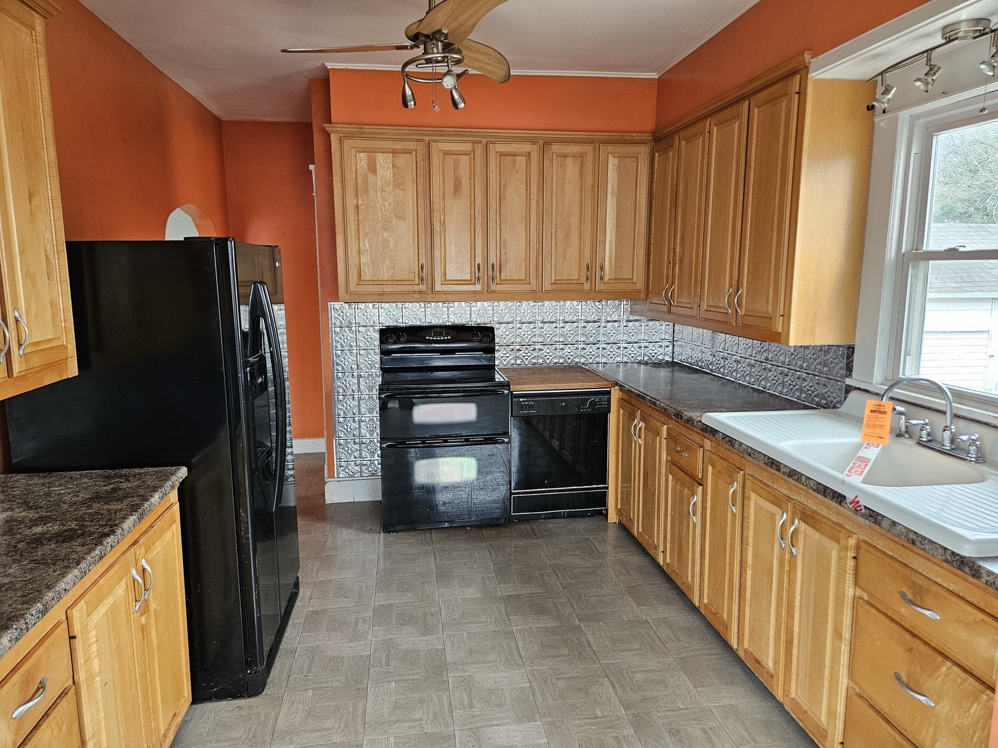 600 North 1st Street Fairfield, IL 62837 - Photo 11 of 23 a kitchen with stainless steel appliances granite countertop a refrigerator a stove and a sink
