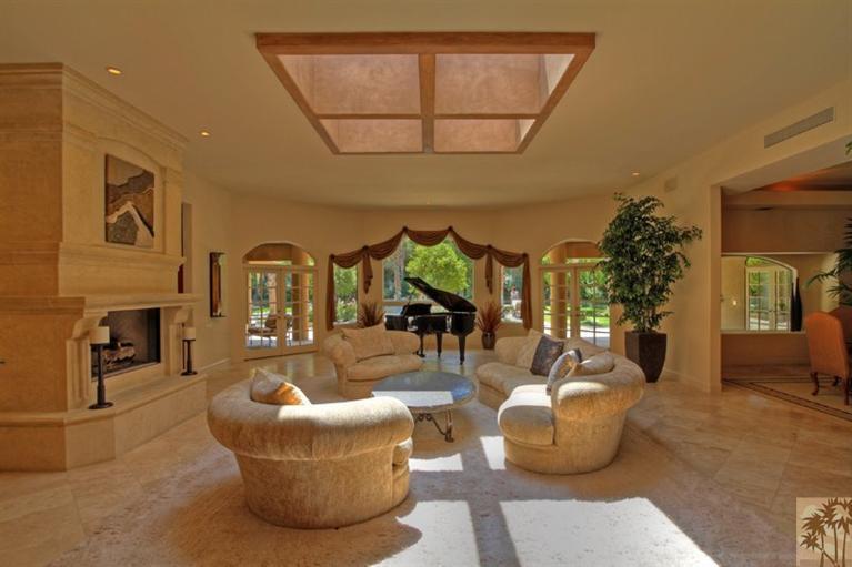 70570 Boothill Road Rancho Mirage, CA 92270 - Photo 7 of 35 a living room with furniture and a window