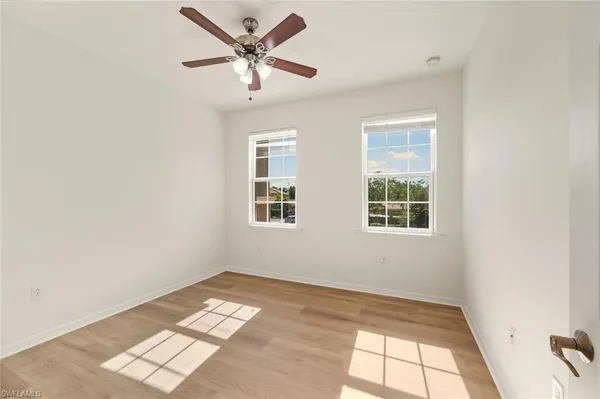 a bathroom with a double vanity sink mirror and shower