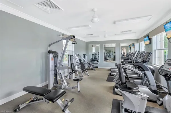 a view of a swimming pool with a lounge chair