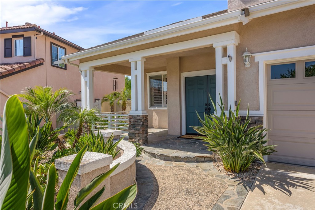 33351 Nicholas Common Temecula, CA 92592 - Photo 7 of 42 a view of a house with patio