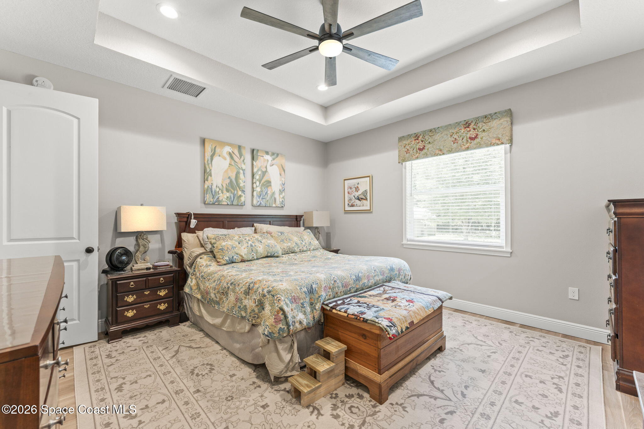 1740 Ford Road Mims, FL 32754 - Photo 20 of 43 a bedroom with a bed mirror and a window