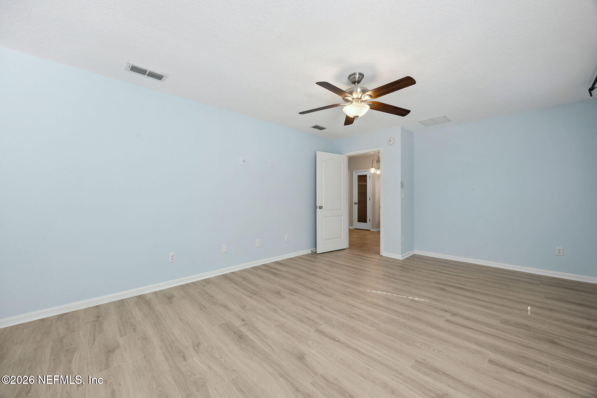 1602 Indigo Street Fernandina Beach, FL 32034 - Photo 21 of 35 a view of an empty room with a fan