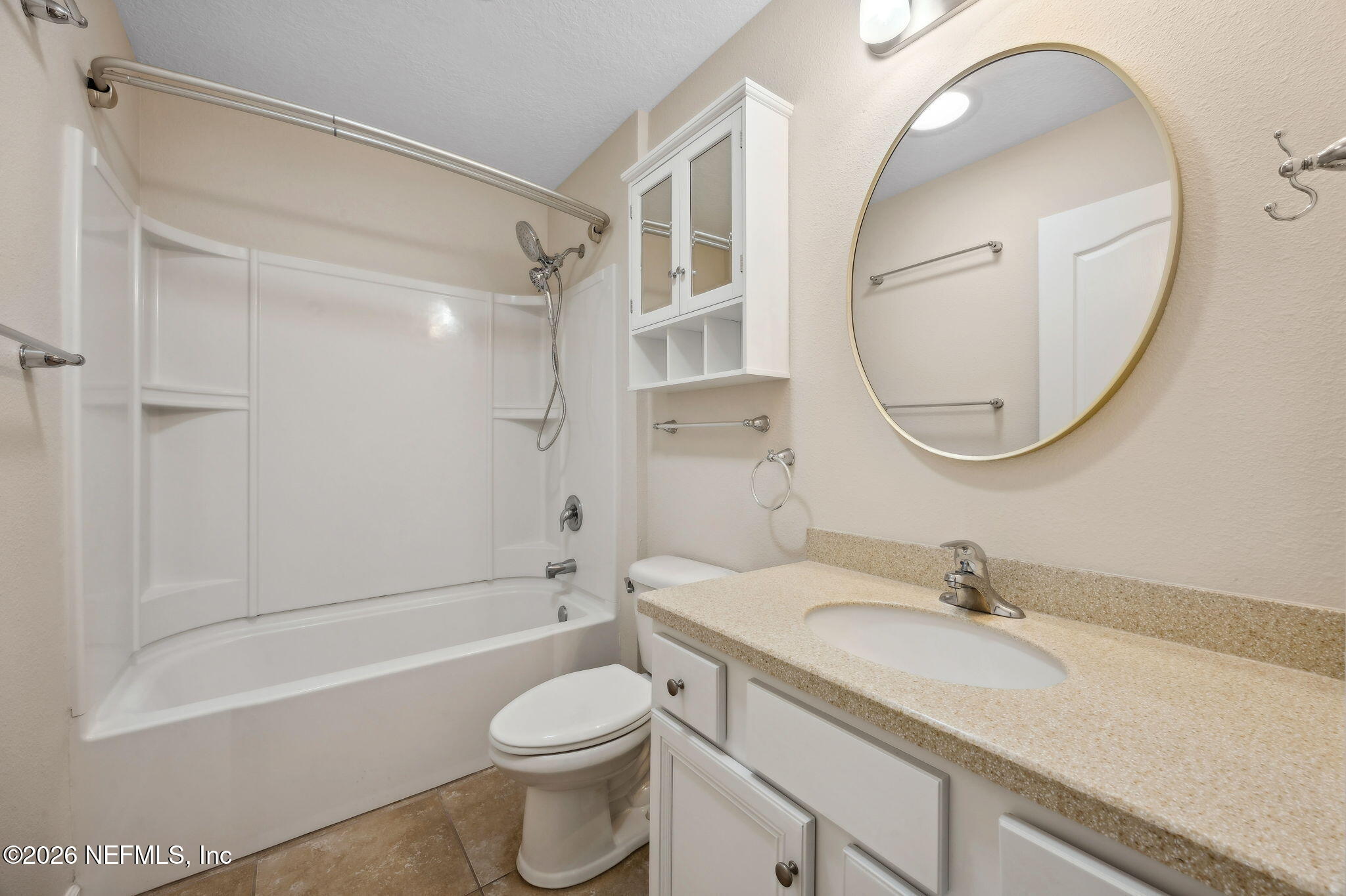 1602 Indigo Street Fernandina Beach, FL 32034 - Photo 27 of 35 a bathroom with a granite countertop sink a toilet and a mirror