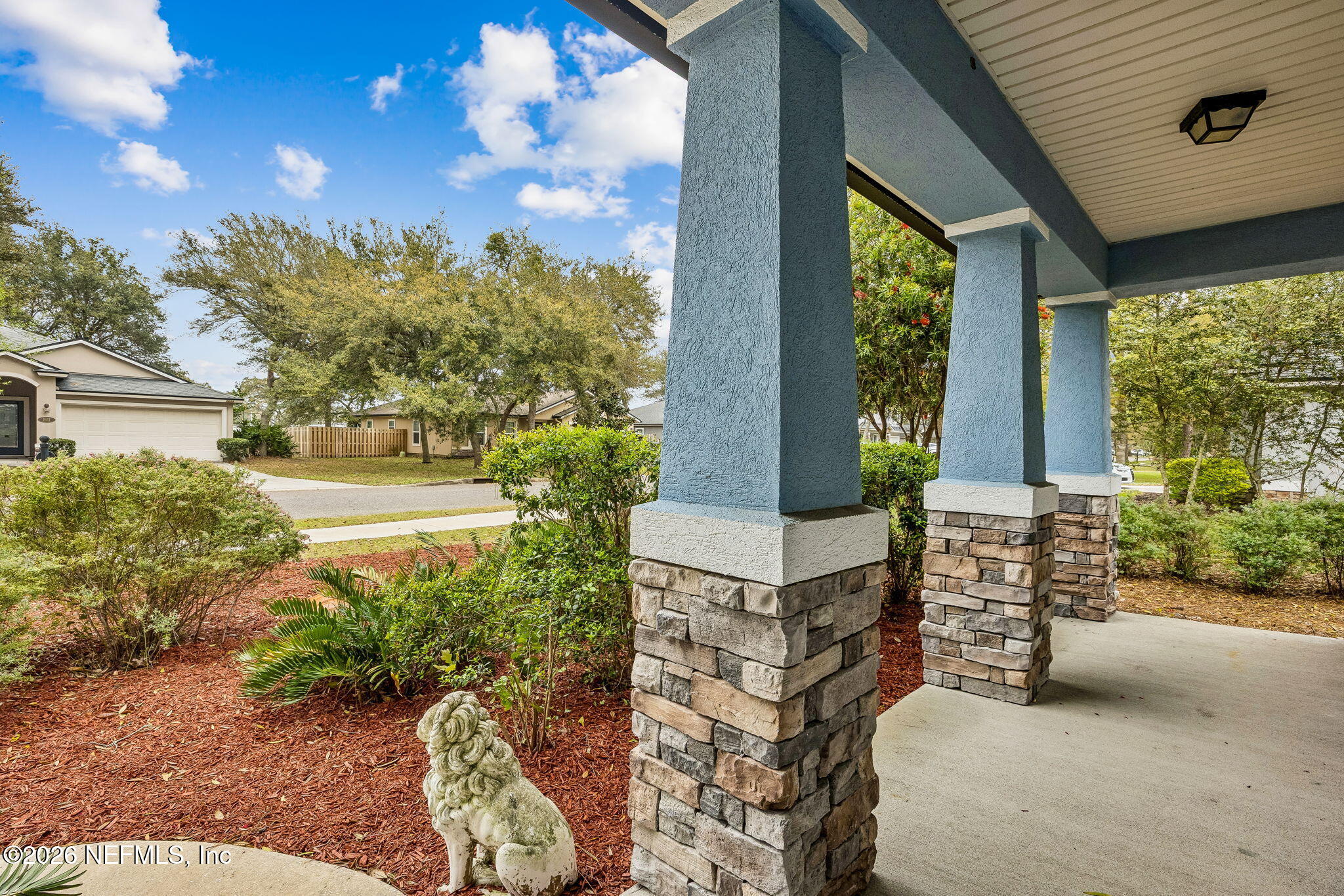 1602 Indigo Street Fernandina Beach, FL 32034 - Photo 3 of 35 a front view of a house with garden