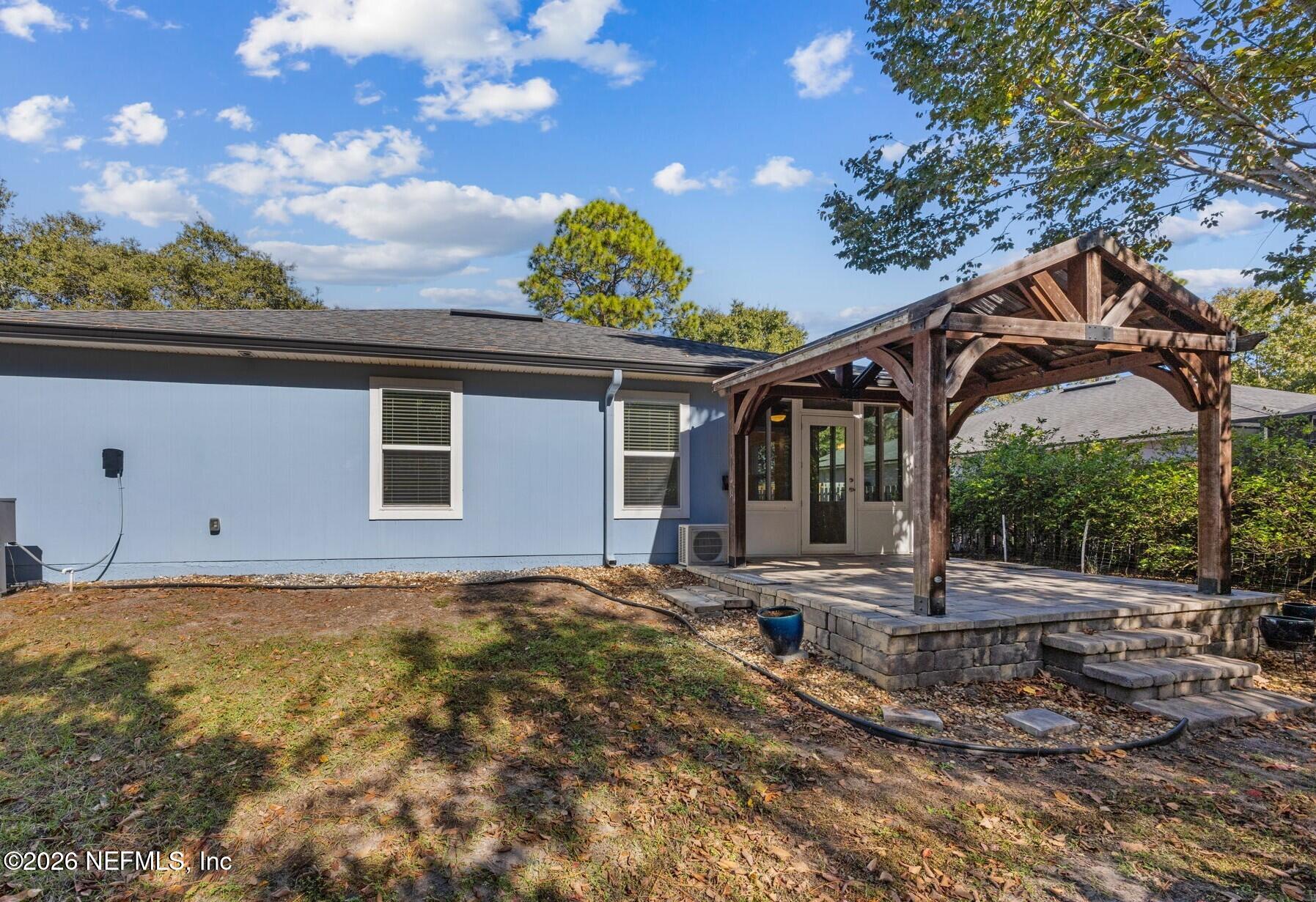 1602 Indigo Street Fernandina Beach, FL 32034 - Photo 33 of 35 a view of a house with a backyard