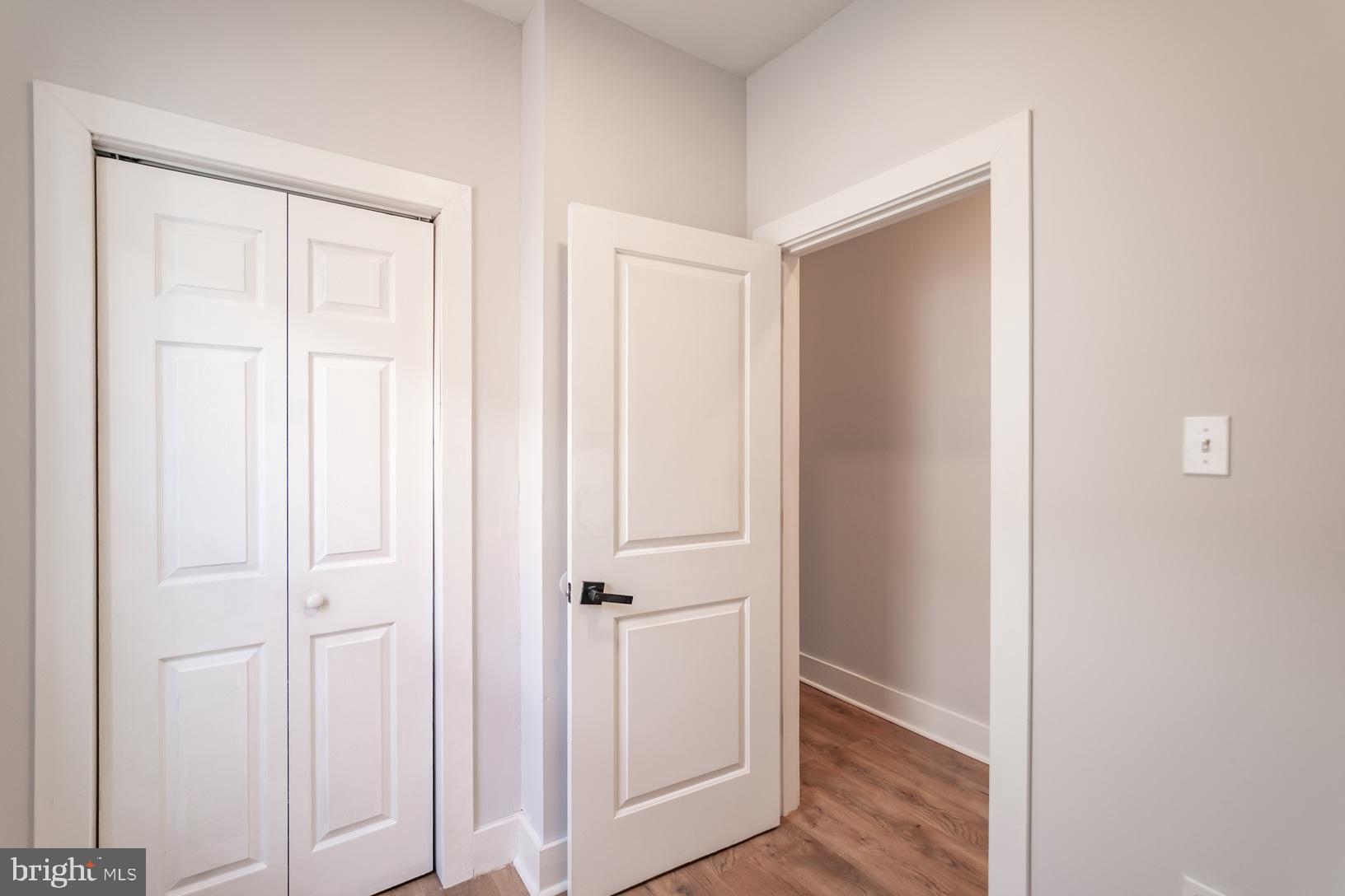 5111 Willows Avenue, Unit B Philadelphia, PA 19143 - Photo 11 of 18 a view of a hallway with wooden floor