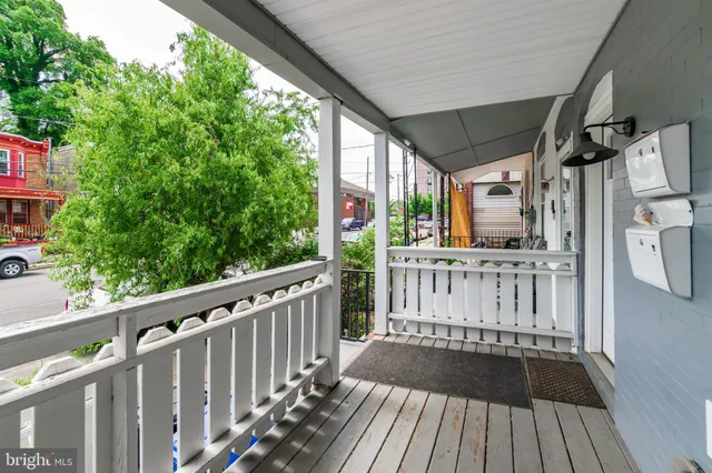 a view of deck with wooden floor and fence