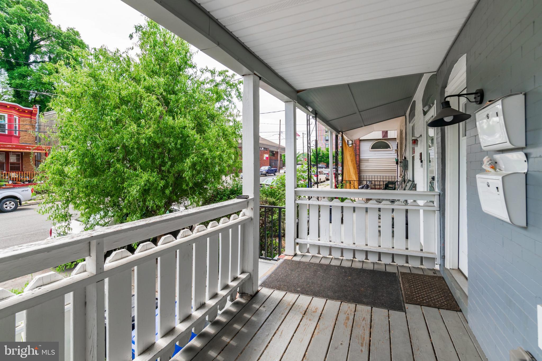 5111 Willows Avenue, Unit B Philadelphia, PA 19143 - Photo 16 of 18 a view of deck with wooden floor and fence