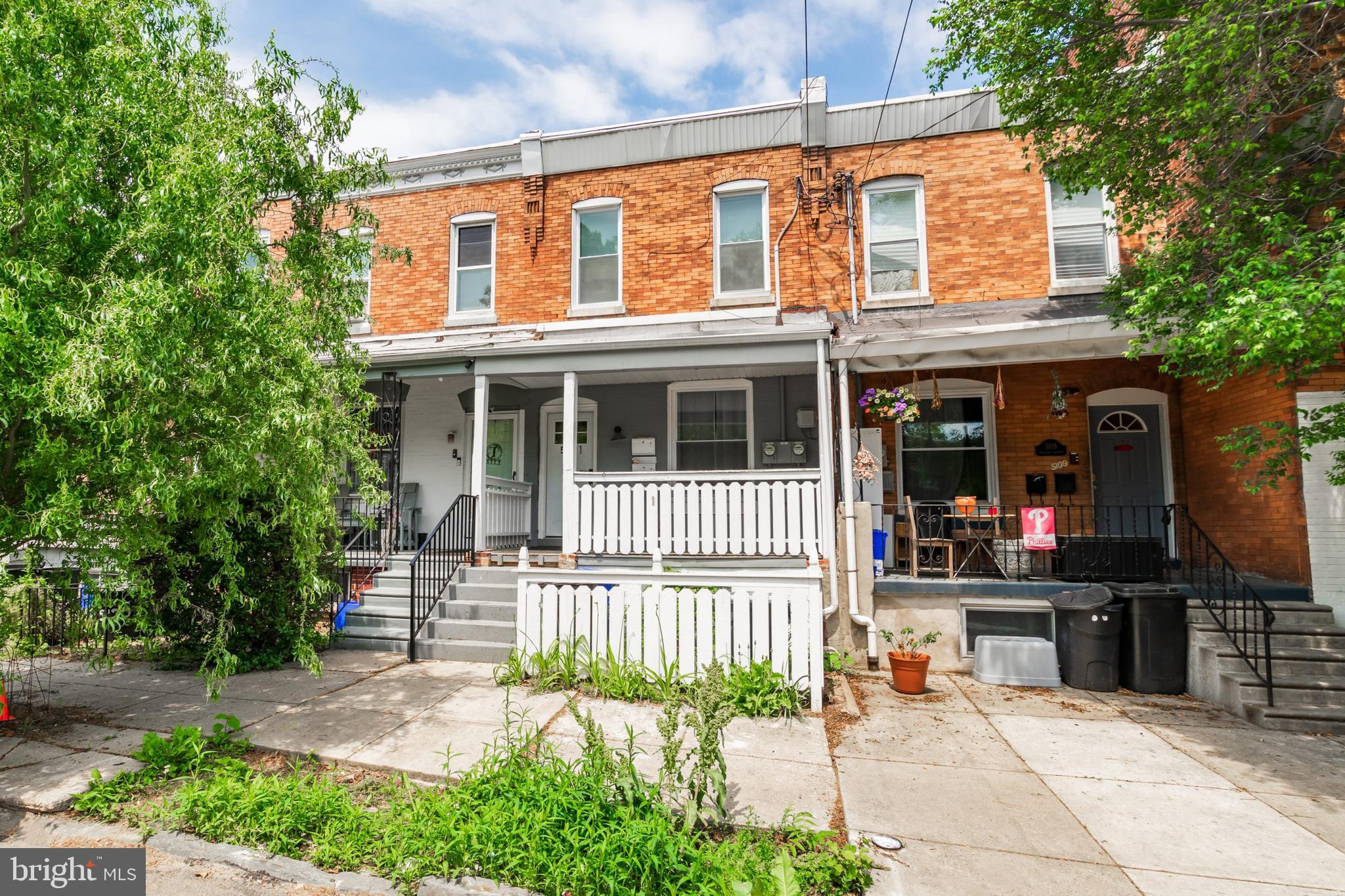 5111 Willows Avenue, Unit B Philadelphia, PA 19143 - Photo 18 of 18 a front view of a house with a porch