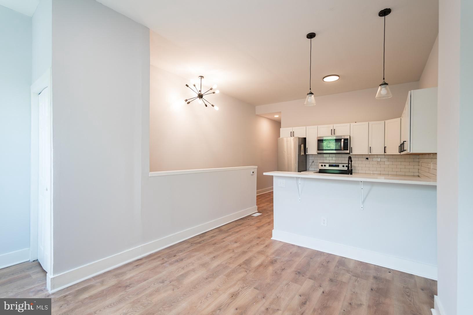 5111 Willows Avenue, Unit B Philadelphia, PA 19143 - Photo 4 of 18 a view of a kitchen with an empty space