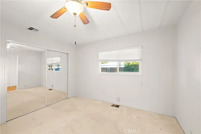 en empty room with windows