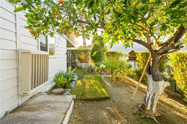 a view of residential houses with outdoor space