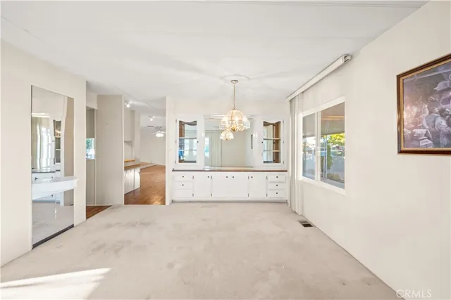 a stove top oven sitting inside of a kitchen