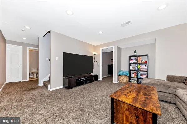 a living room with furniture and a couch
