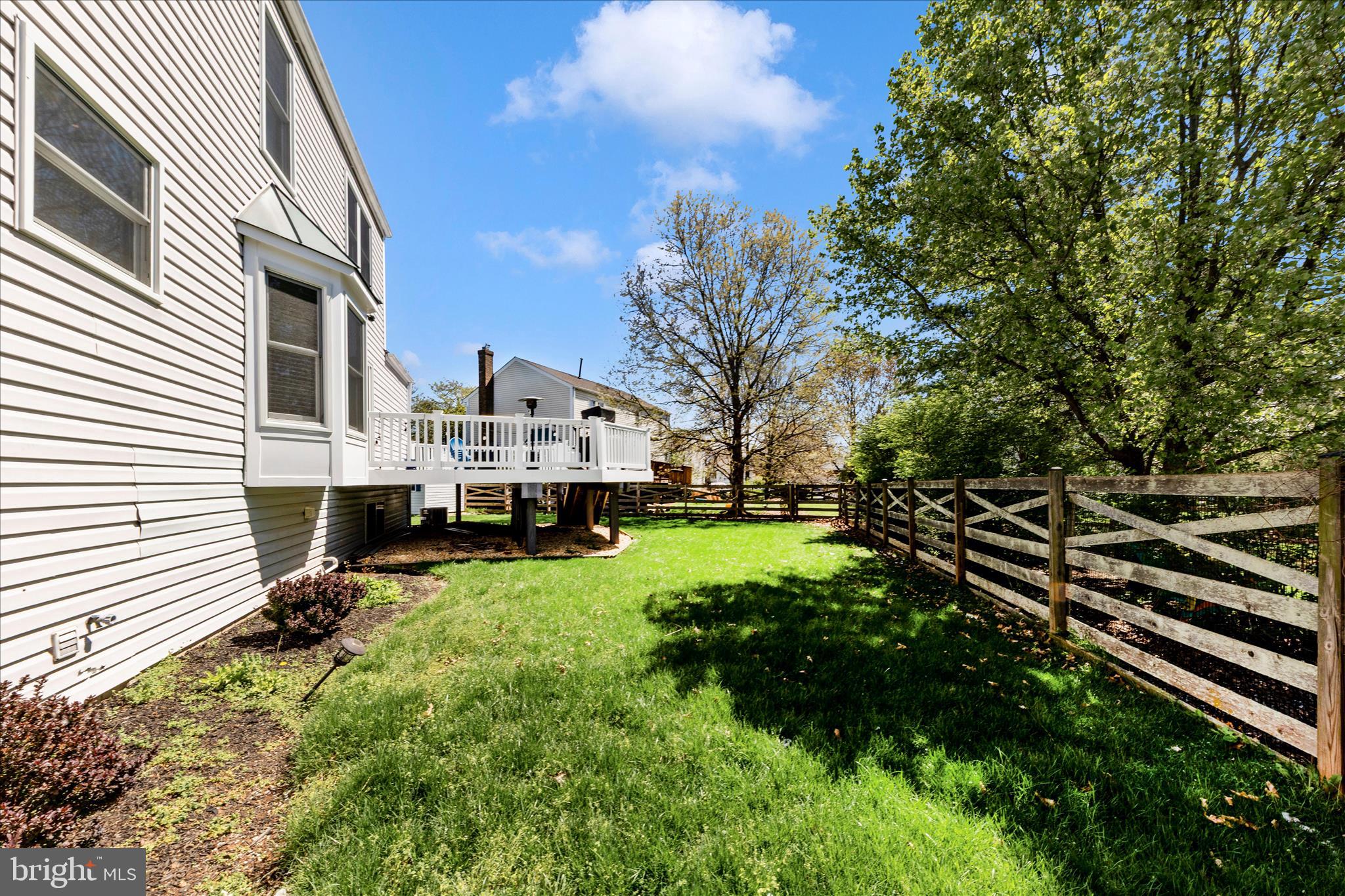 19010 Wootton Avenue Poolesville, MD 20837 - Photo 40 of 51 a view of house with yard