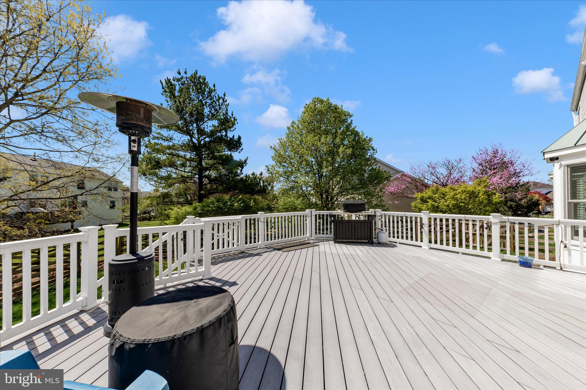 19010 Wootton Avenue Poolesville, MD 20837 - Photo 45 of 51 a view of a deck patio and outdoor seating