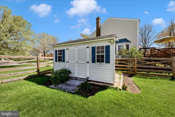 a view of a deck patio and outdoor seating