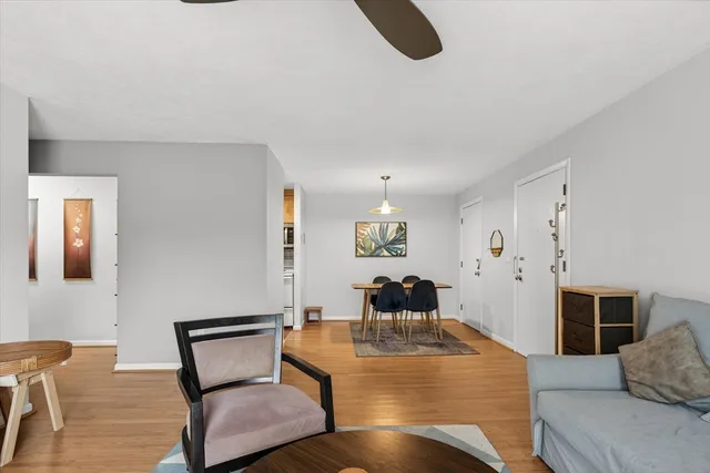 a living room with furniture and a table