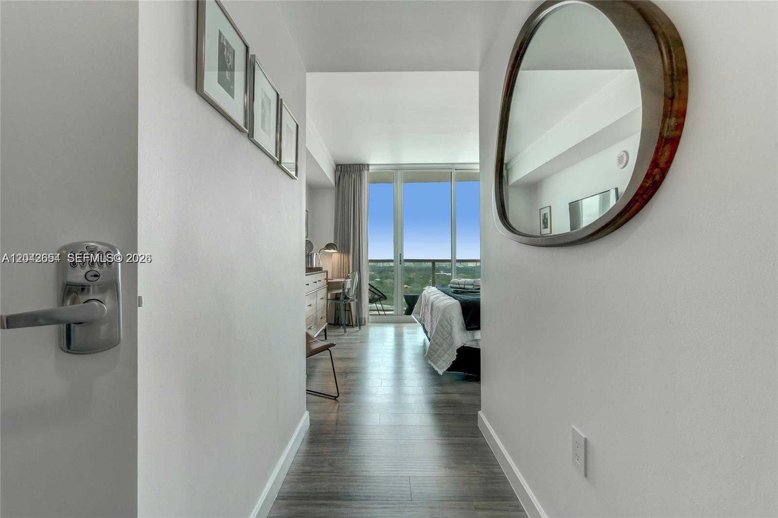 2889 McFarlane Road, Unit 1811 Miami, FL 33133 - Photo 11 of 18 corridor entry to second room