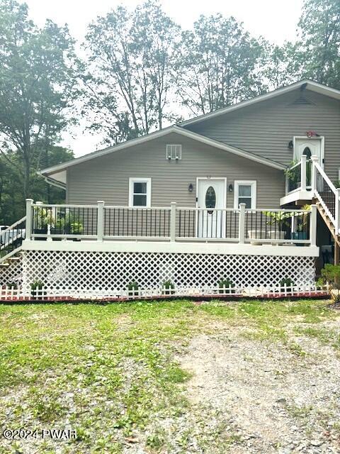 1113 Bracts Road Effort, PA 18330 - Photo 2 of 27 a front view of a house with a garden
