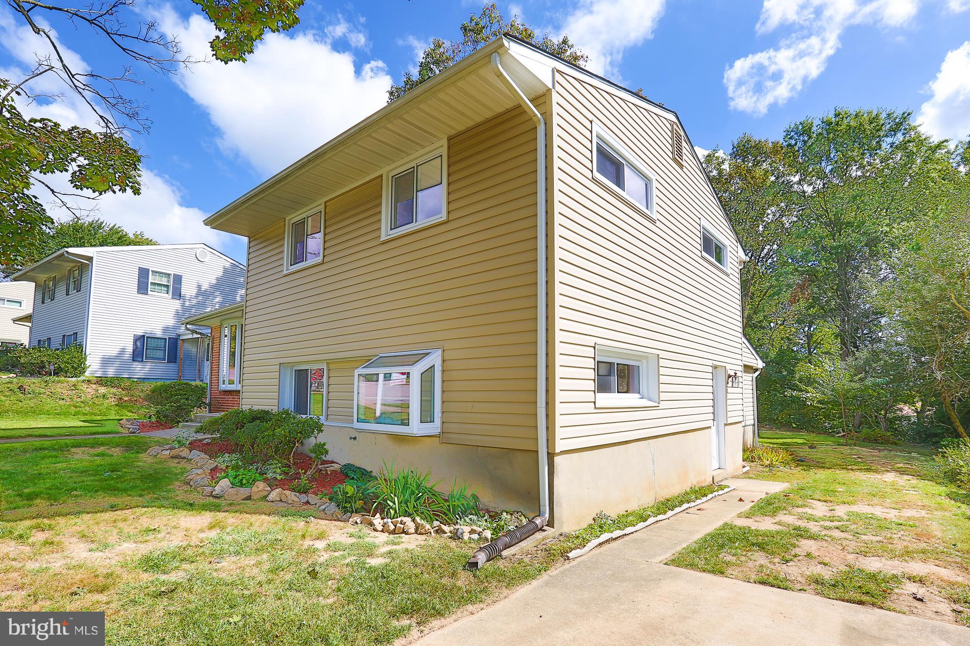 5625 Huntsmoor Road Baltimore, MD 21227 - Photo 2 of 30 a view of a house with a yard