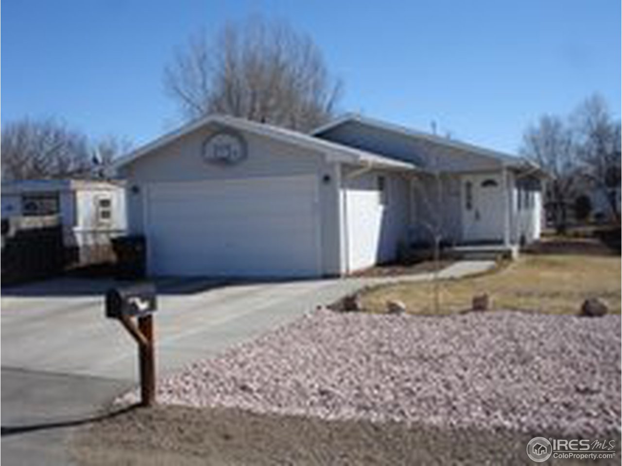 736 Rene Drive Fort Collins, CO 80524 - Photo 1 of 5 Nicely Landscaped Front