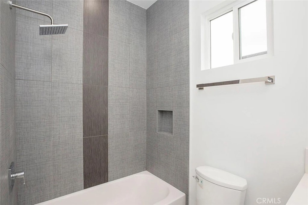 5026 1/2 Cleon Avenue North Hollywood, CA 91601 - Photo 18 of 19 a bathroom with a toilet and a sink