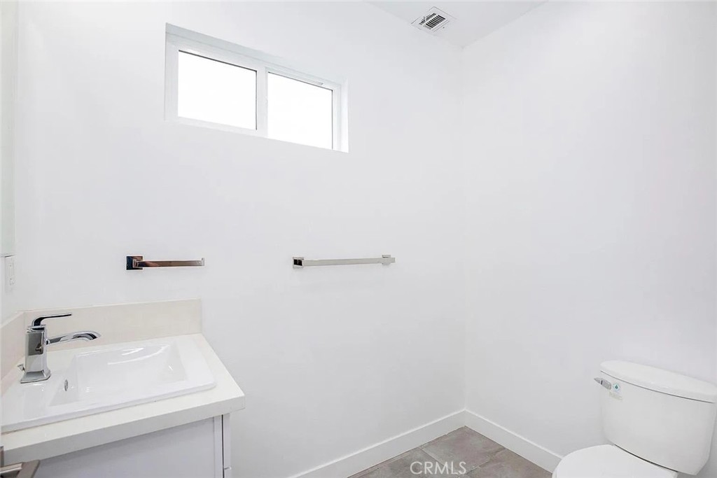 5026 1/2 Cleon Avenue North Hollywood, CA 91601 - Photo 19 of 19 a bathroom with a sink and a vanity