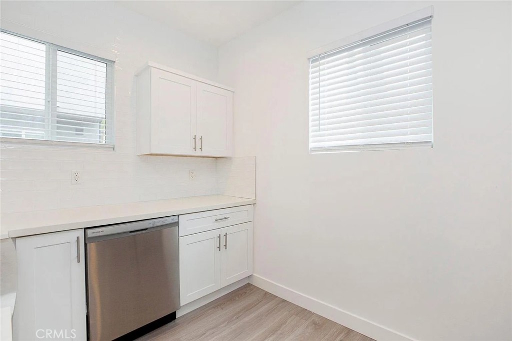 5026 1/2 Cleon Avenue North Hollywood, CA 91601 - Photo 6 of 19 a view of cabinets with wooden floor