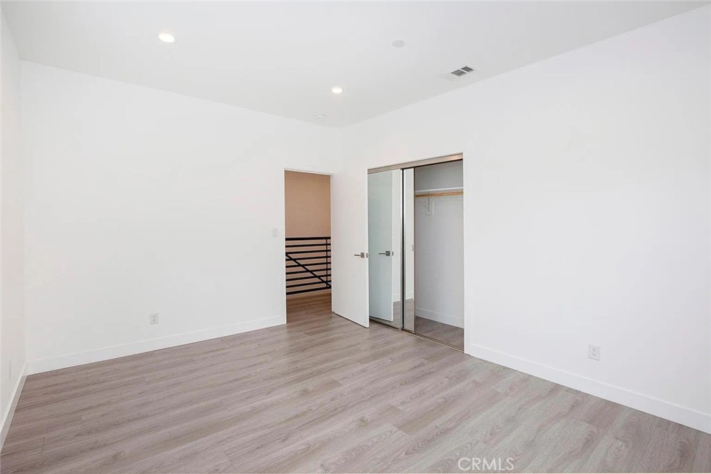 5026 1/2 Cleon Avenue North Hollywood, CA 91601 - Photo 10 of 19 a view of empty room with wooden floor