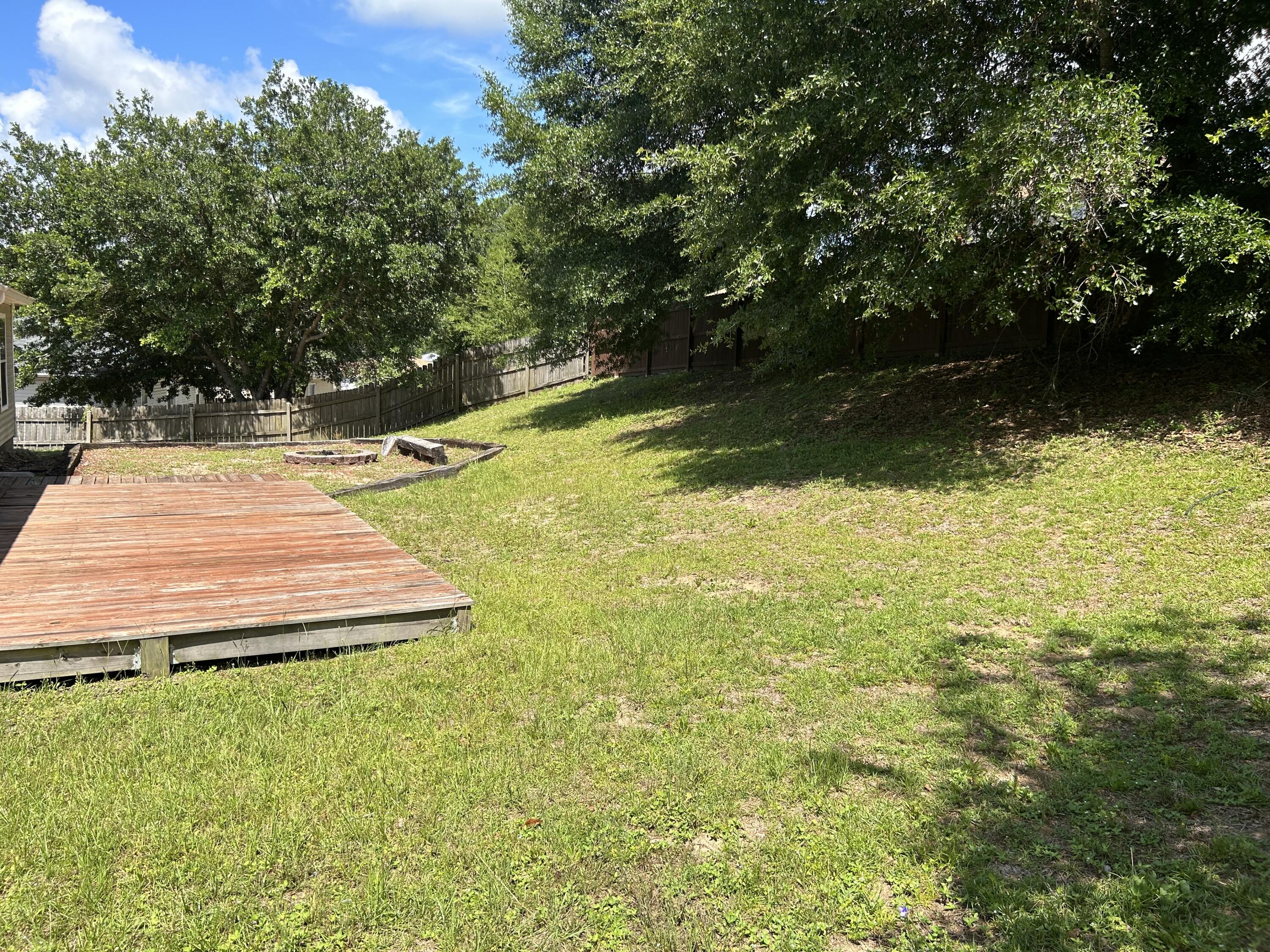 203 Cabana Way Crestview, FL 32536 - Photo 23 of 25 a view of a swimming pool with an outdoor space