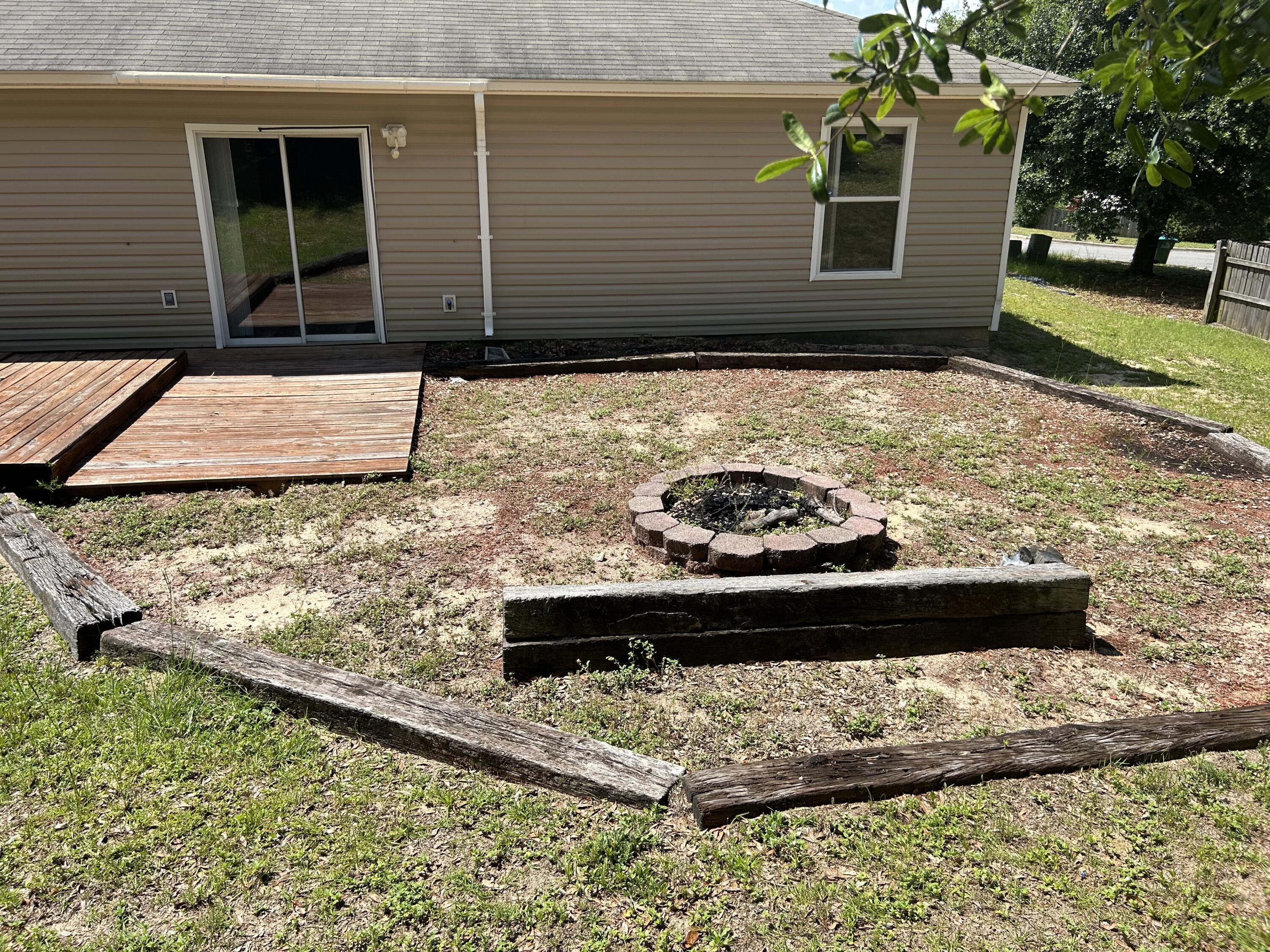 203 Cabana Way Crestview, FL 32536 - Photo 24 of 25 a view of a backyard of the house