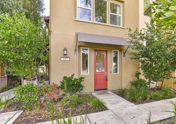 a view of entryway with wooden floor and stairs