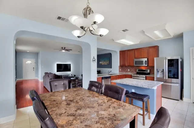 a view of a dining room with furniture