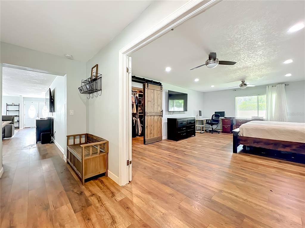 153 Variety Tree Circle Altamonte Springs, FL 32714 - Photo 21 of 44 a living room with furniture and a wooden floor