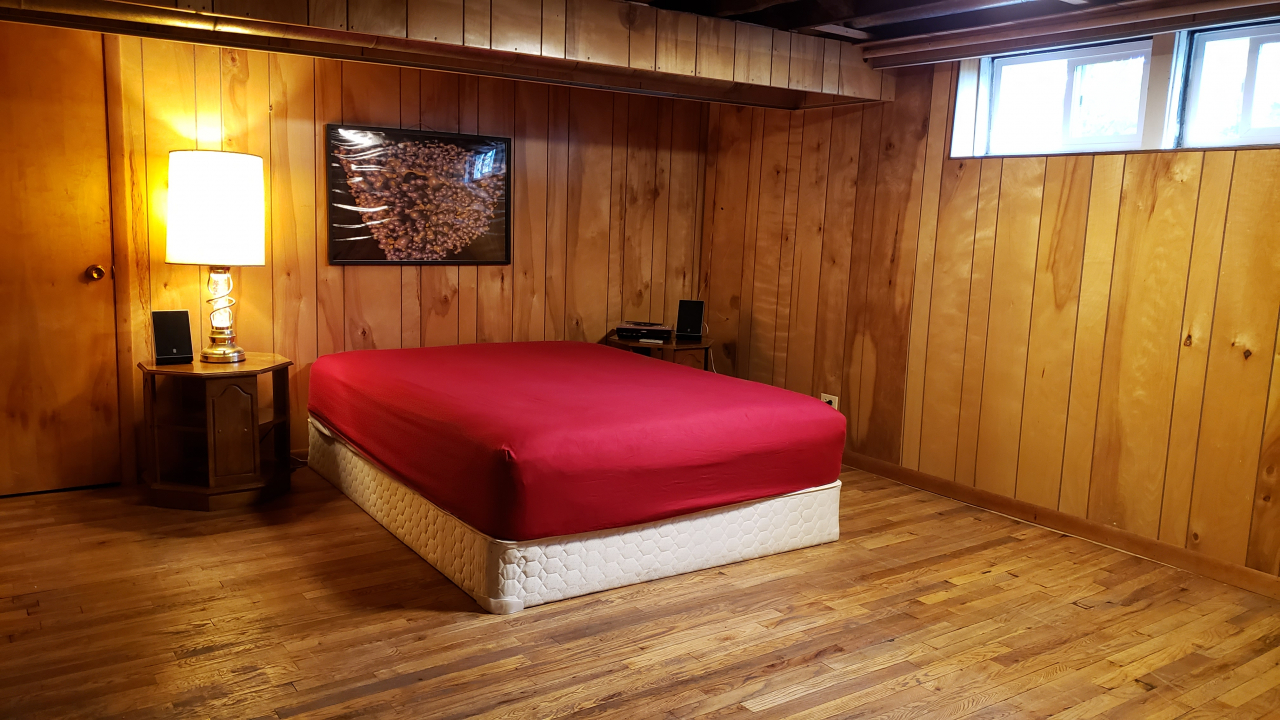 170 South Delaplaine Road Riverside, IL 60546 - Photo 11 of 55 a bed sitting in a bedroom next to a window