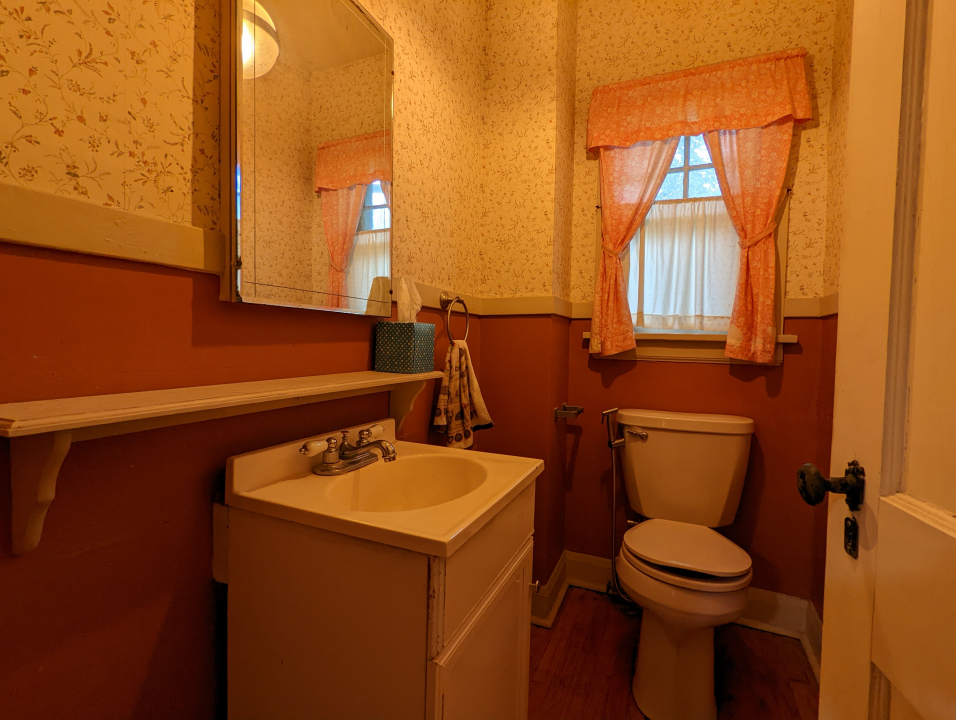 170 South Delaplaine Road Riverside, IL 60546 - Photo 15 of 55 a bathroom with a sink and a toilet