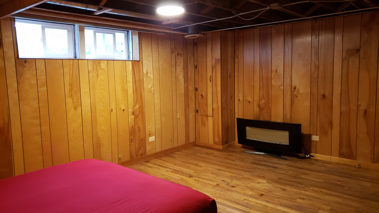 170 South Delaplaine Road Riverside, IL 60546 - Photo 8 of 55 a view of empty room with wooden floor and fan