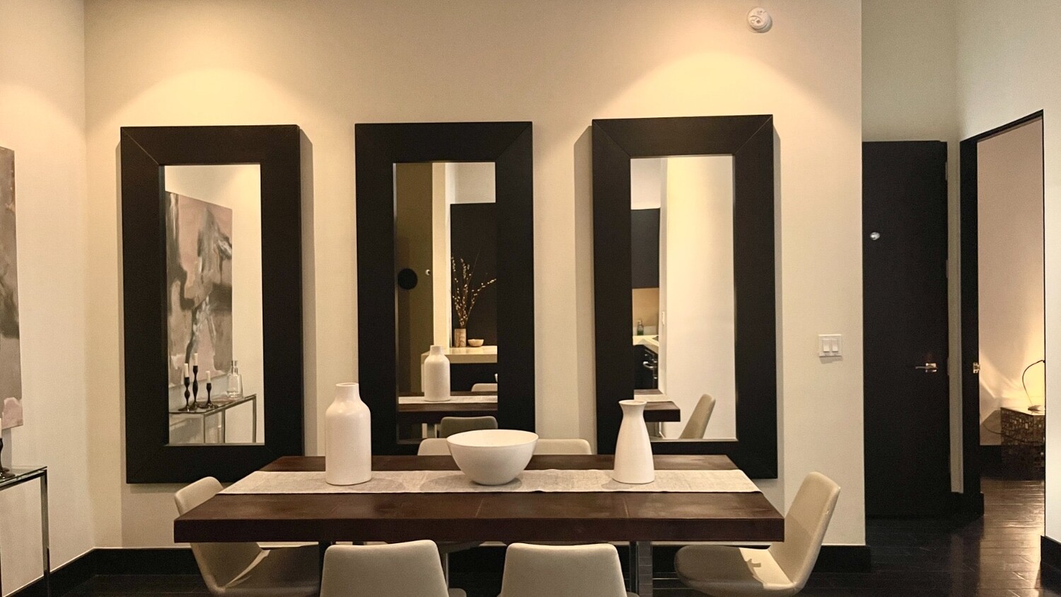 254 Park Avenue South, Unit 6A Manhattan, NY 10010 - Photo 5 of 9 a dining room with table and chairs