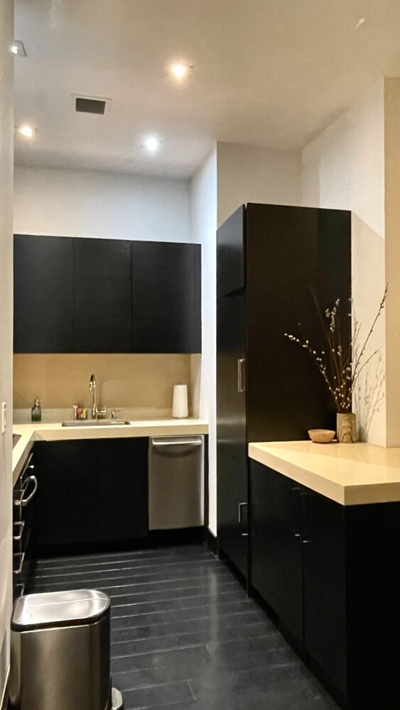 254 Park Avenue South, Unit 6A Manhattan, NY 10010 - Photo 8 of 9 a bathroom with a sink and mirror