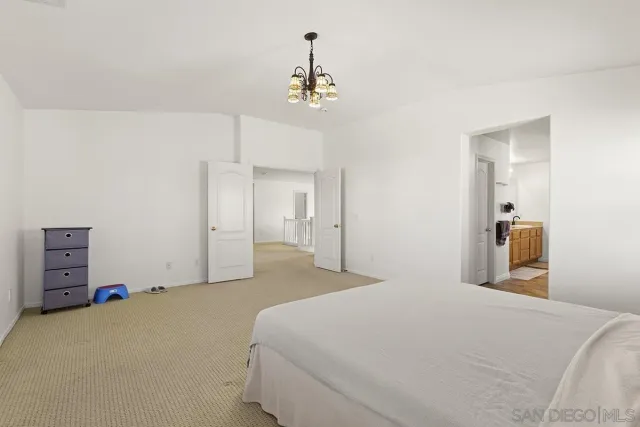 a view of a workspace with furniture