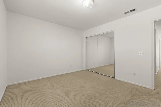 a view of a park with swings and slides